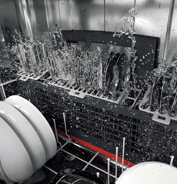 Dishes being washed in a GE Appliances Dishwasher with Deep Clean Silverware Jets